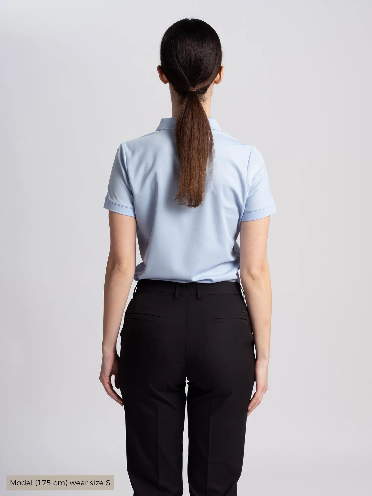 AMY_POLOSHIRT_Cross_sportswear_blue_back