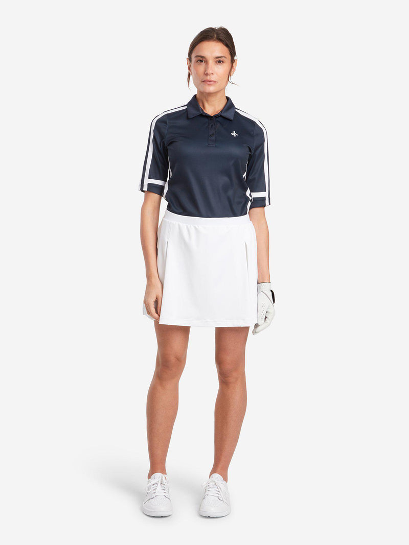 L30-W_Stella_Skort_White-W_Peg_Polo_Navy-1542